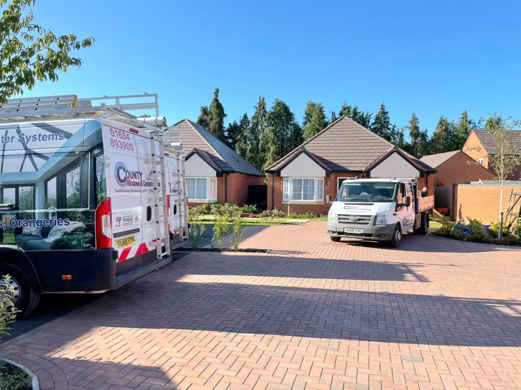 The County Windows vans outside a local Malvern double-glazed windows refurbishment site. Your local window fitters.
