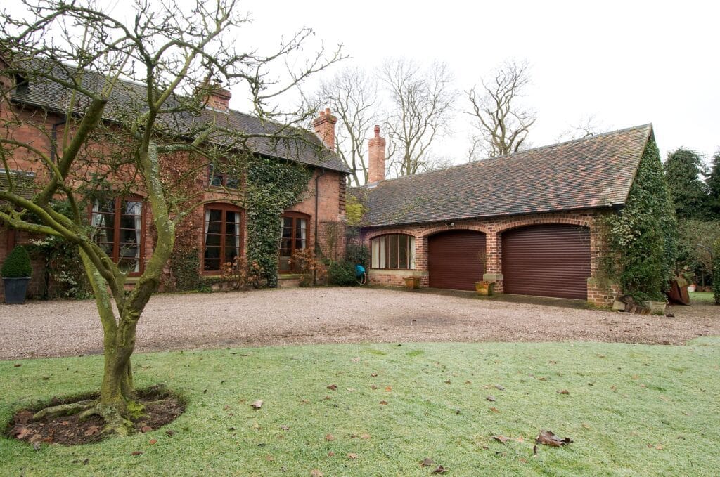 Rosewood-finish compact Aluroll garage doors
